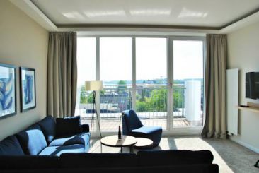 Penthouse Suite with Balcony and Partial Sea View